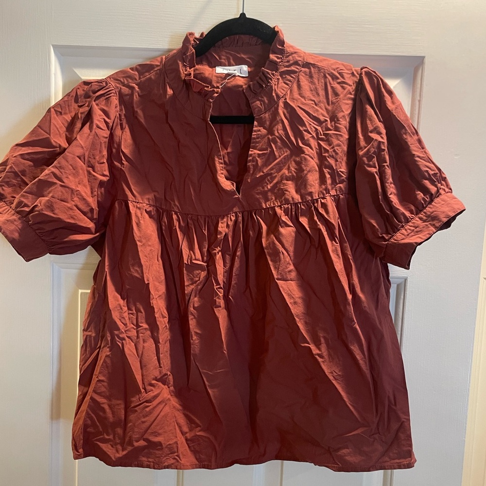 THML top rust orange color